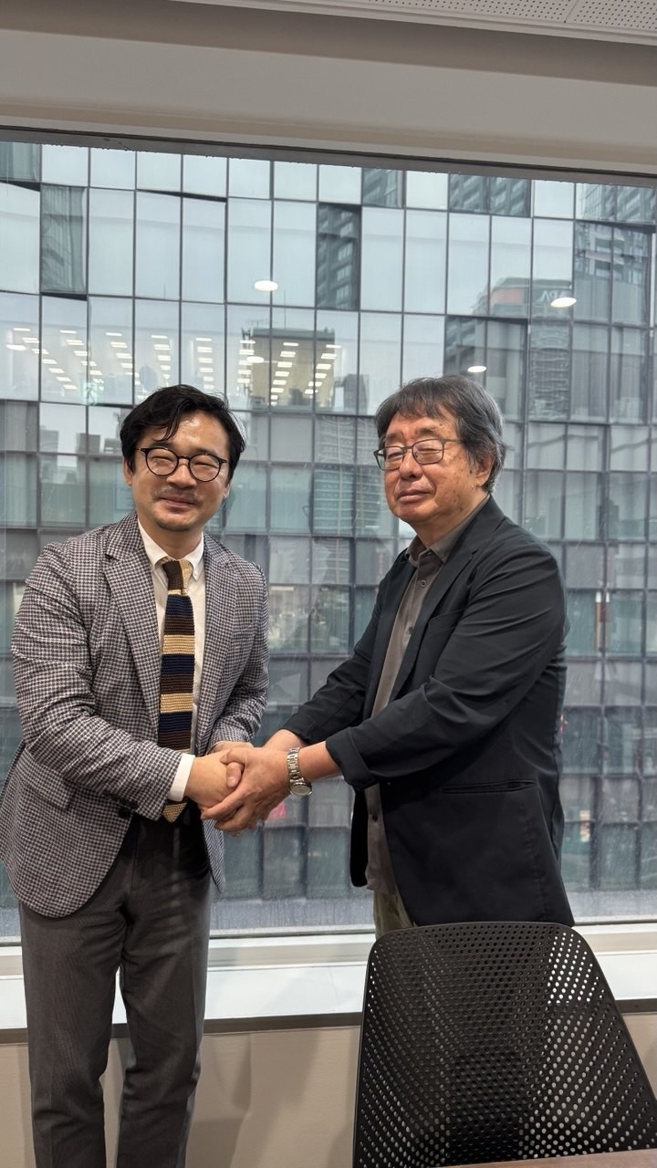 文京洙先生と私。