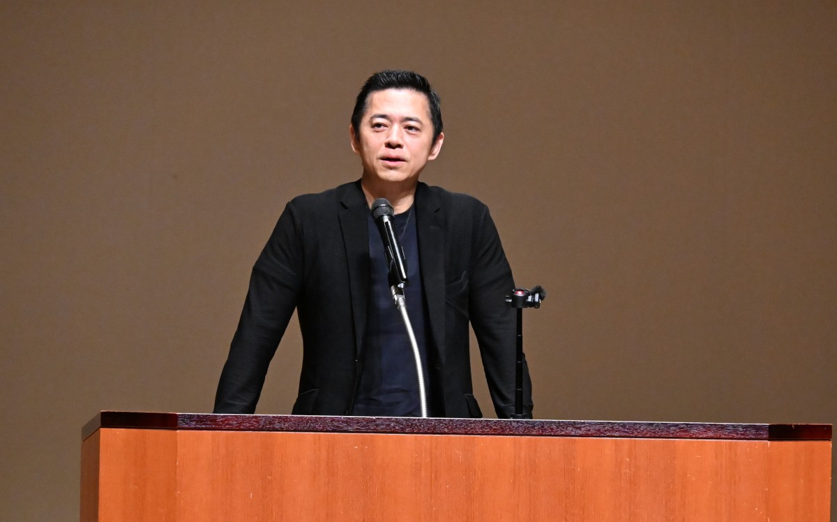 （講演するあえば浩明）